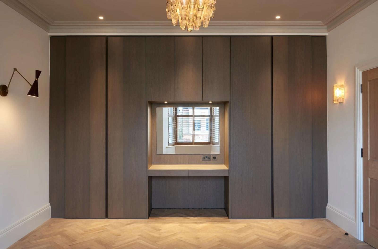 Fitted wardrobes with a recessed dressing table