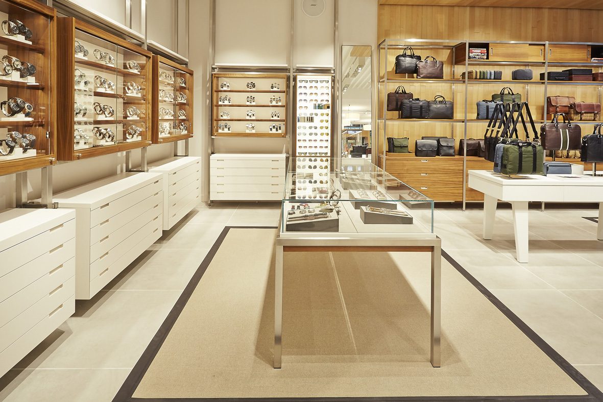 Glass display cases and lacquered drawer units