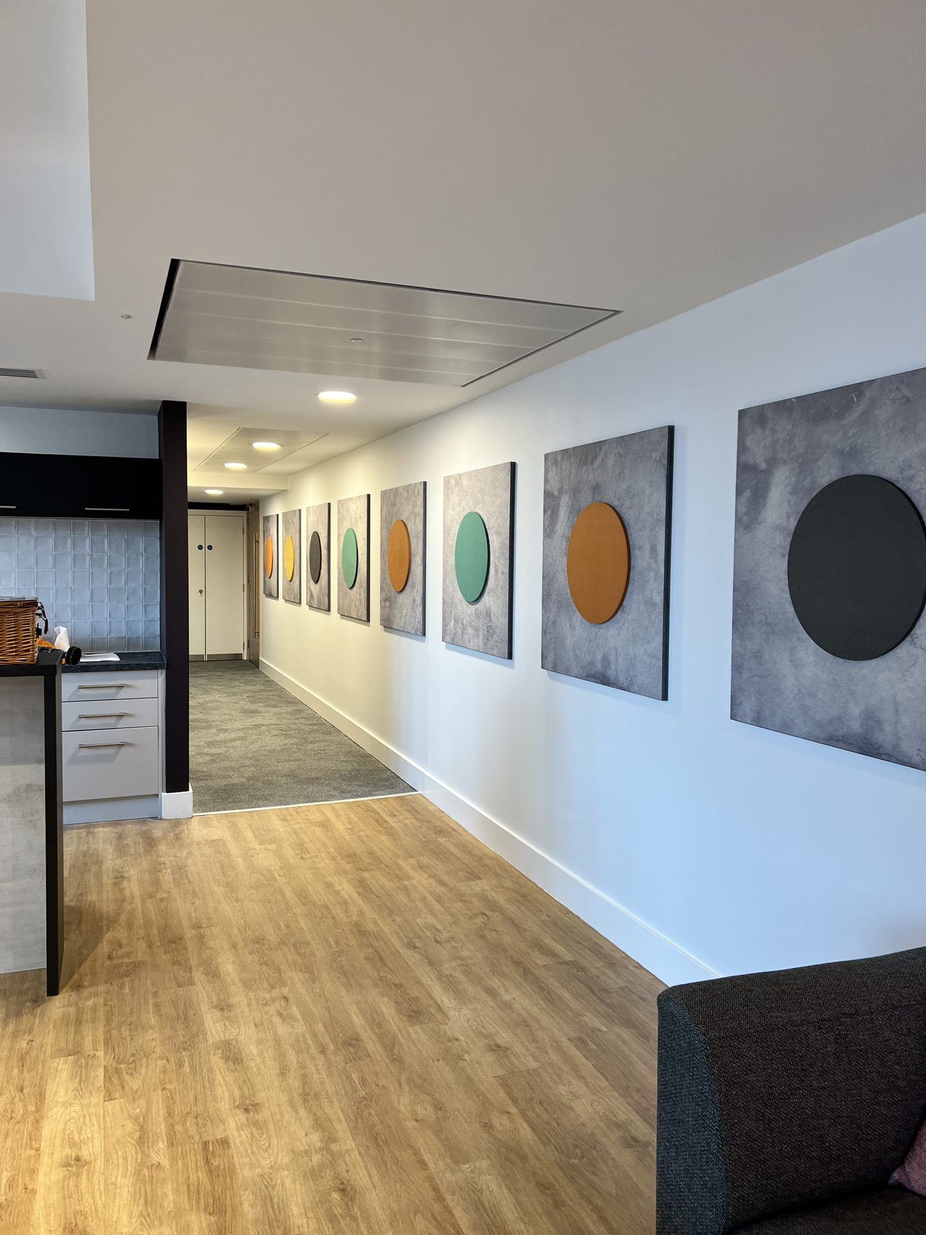 Breakout and townhall space with acoustic artwork
