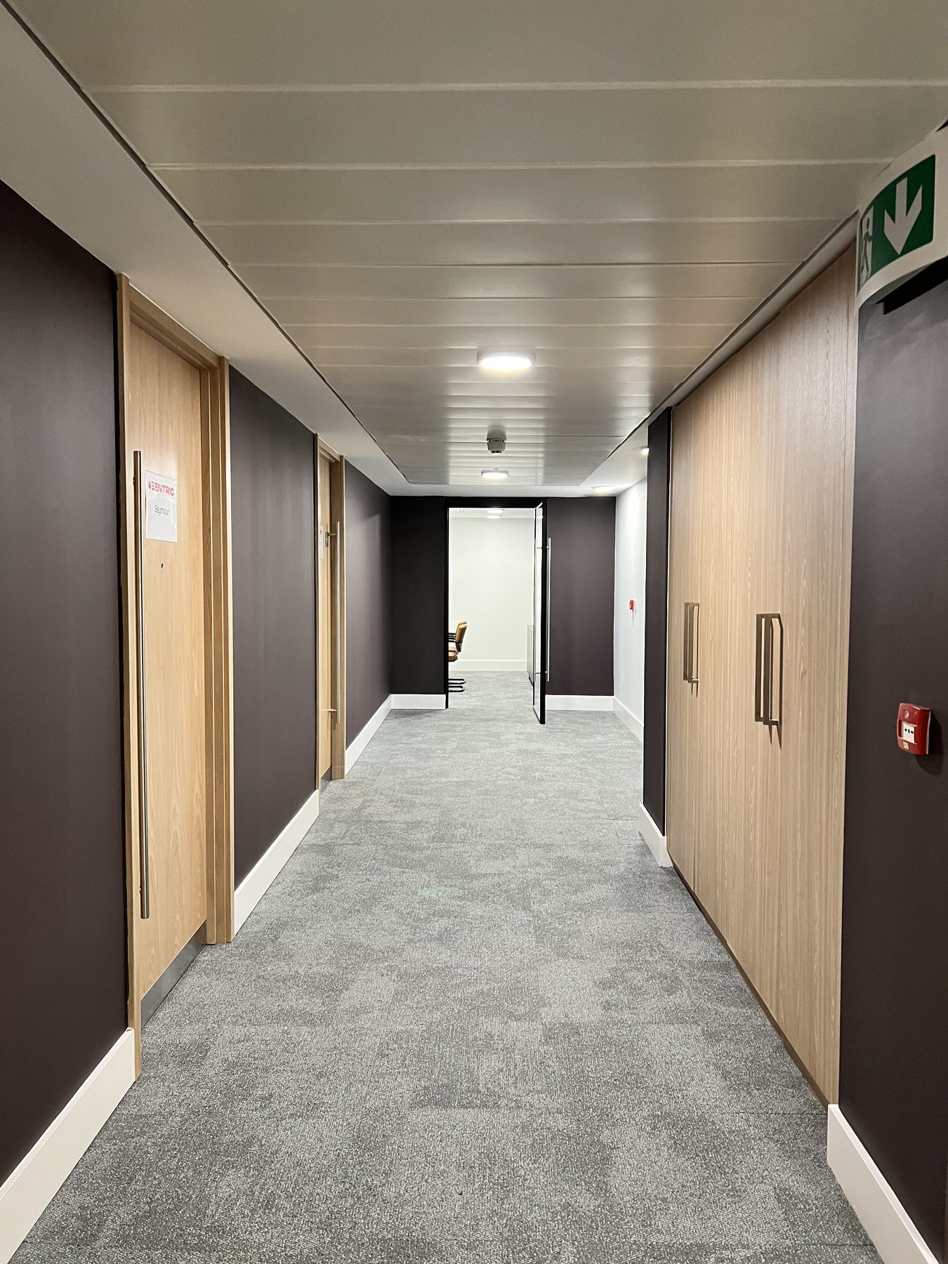 Upholstered pods against the record wall