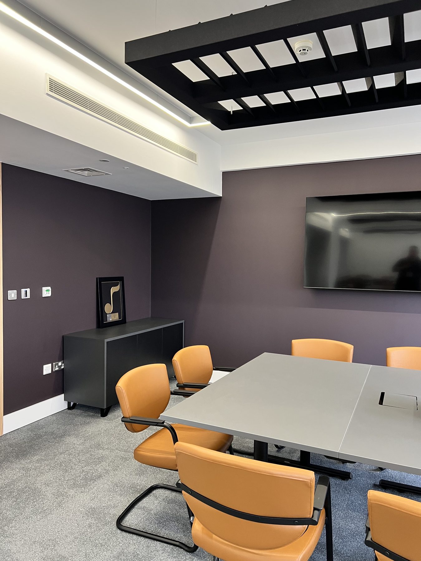 Media wall and slatted timber