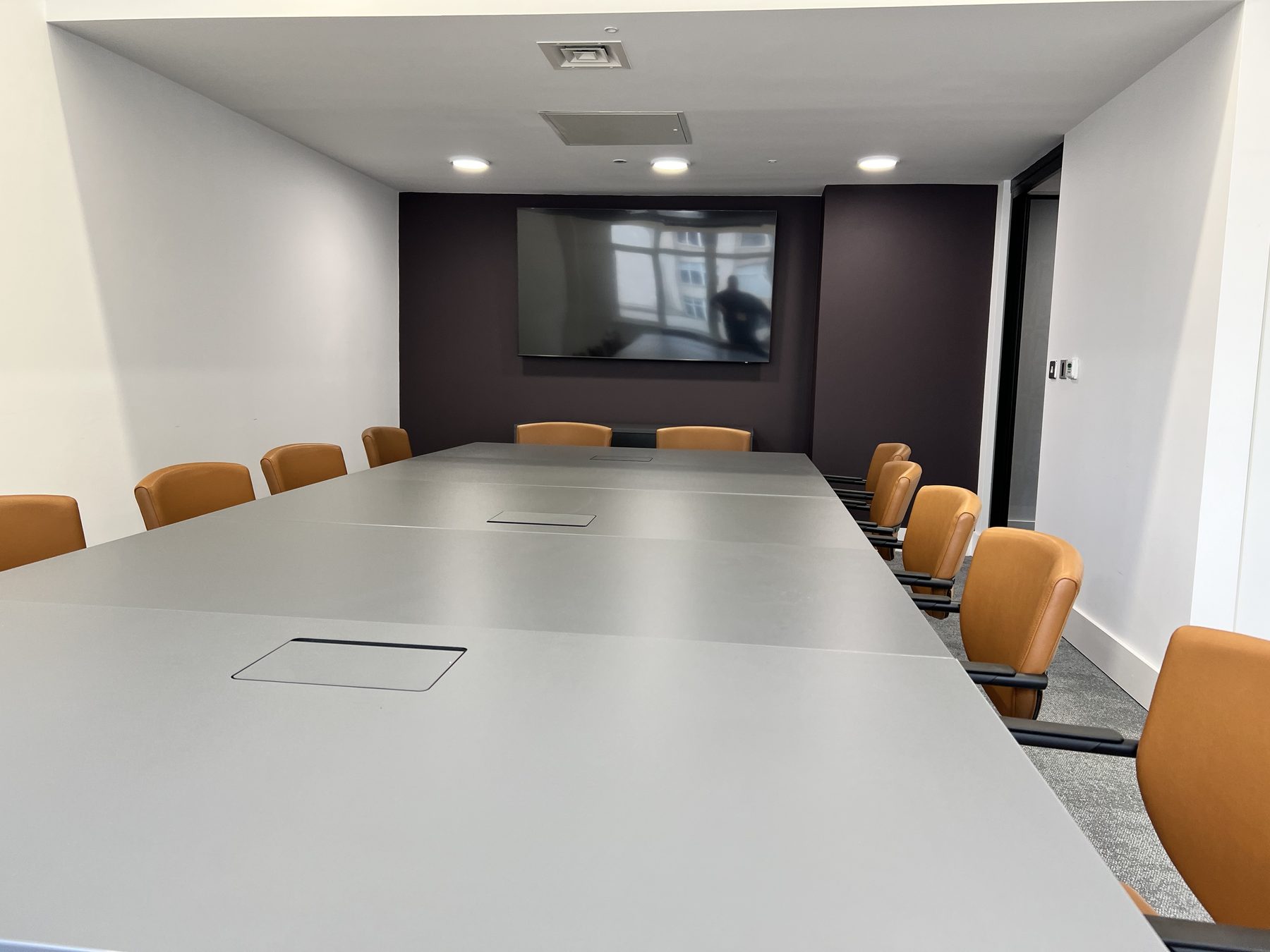 Acoustic panels running the length of the corridor