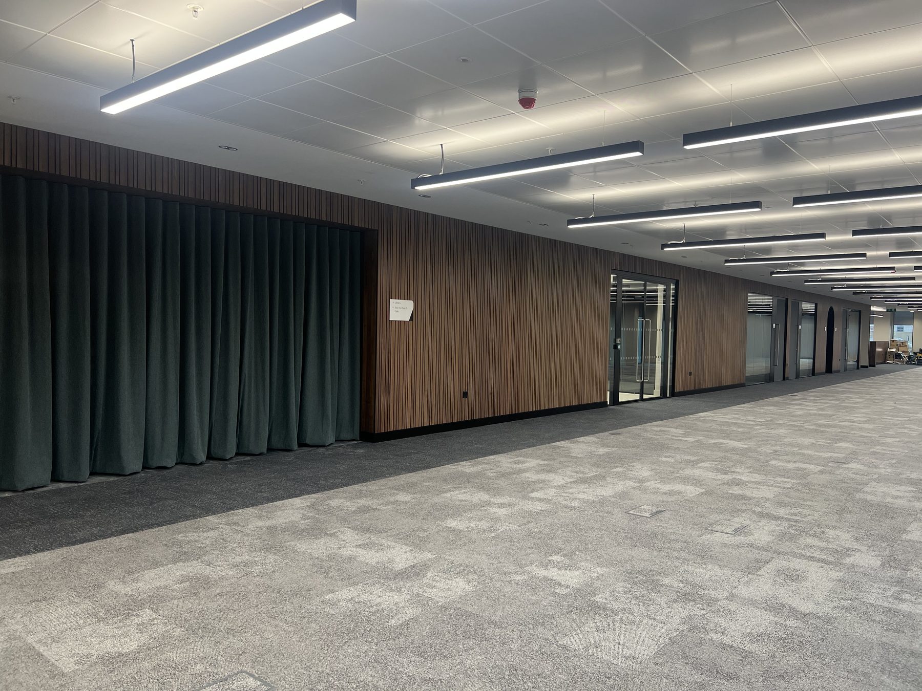 Acoustic curtain and the meeting suite running the length of the floor